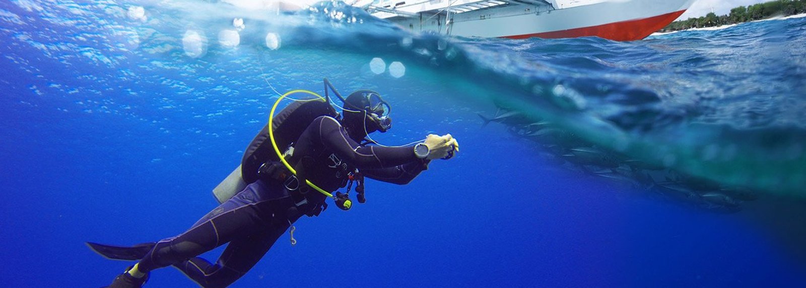 Certified diver carrying out an underwater hull inspection